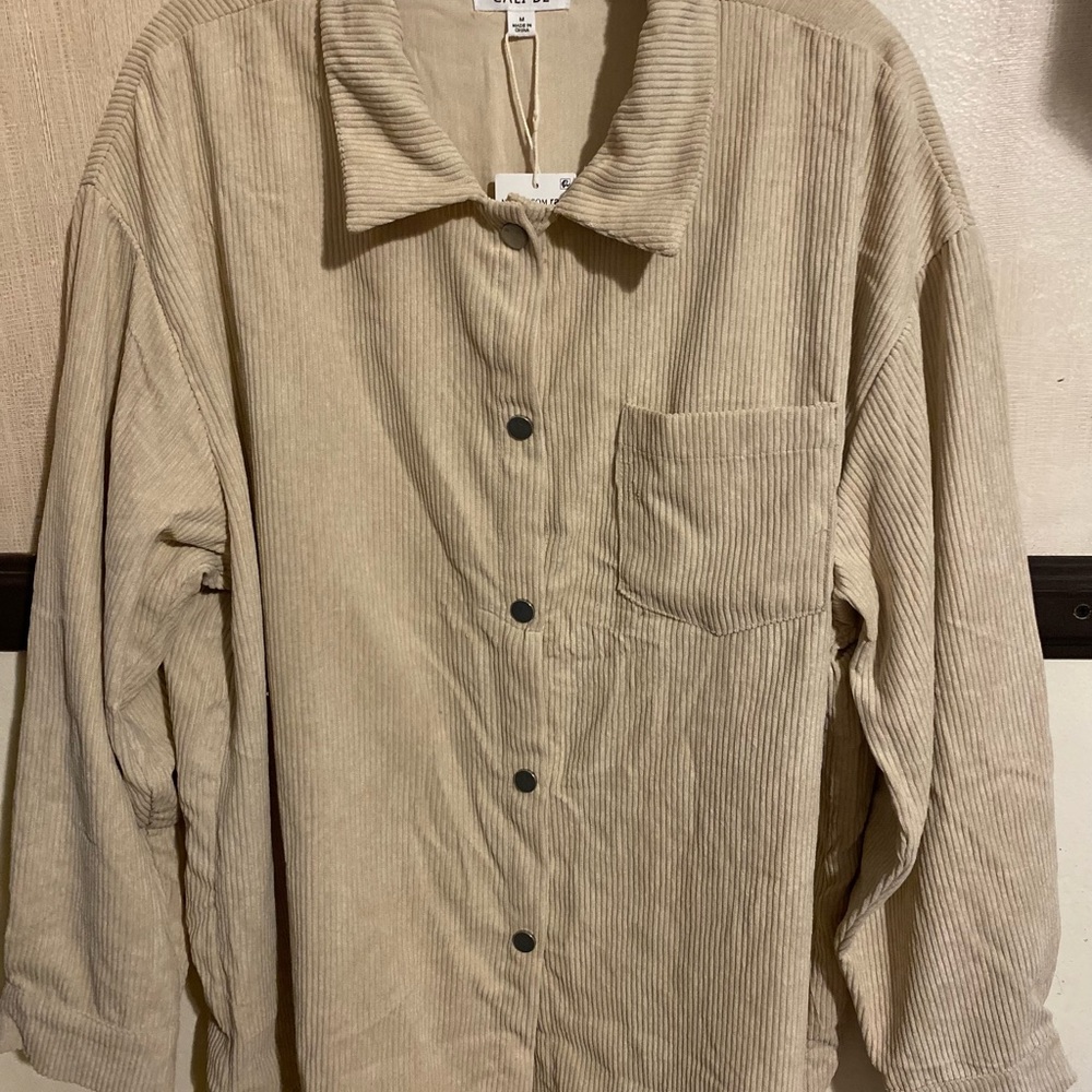 Cali B Womens lightweight beige corduroy shirt/jacket with button sleeves.